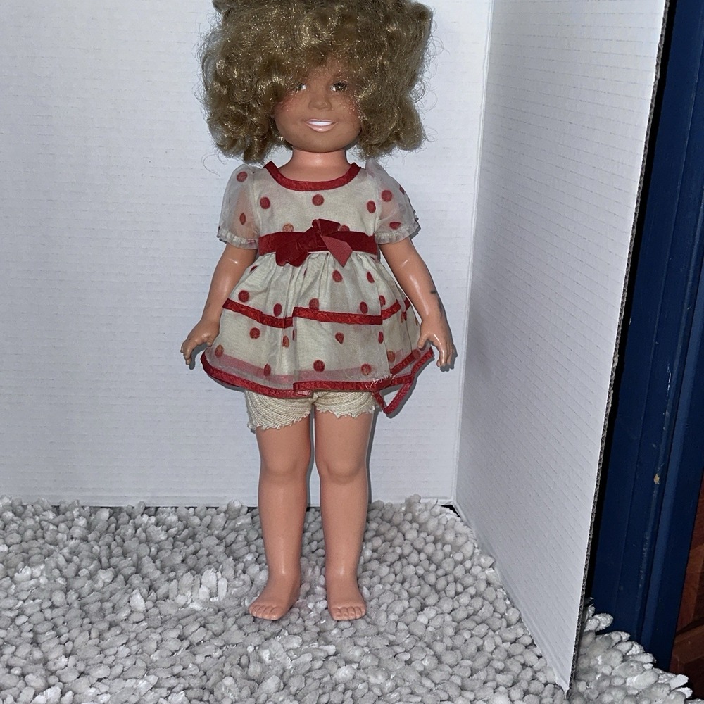 This is a vintage Shirley Temple doll